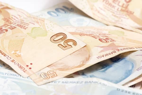 President Erdogan doubles down on rates policy as Turkish lira slides to record low